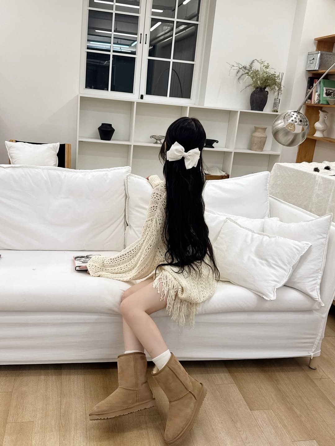 Photo by 오 지은 on October 30, 2025. May be an image of one or more people, braids, dress, boots, headdress and text.