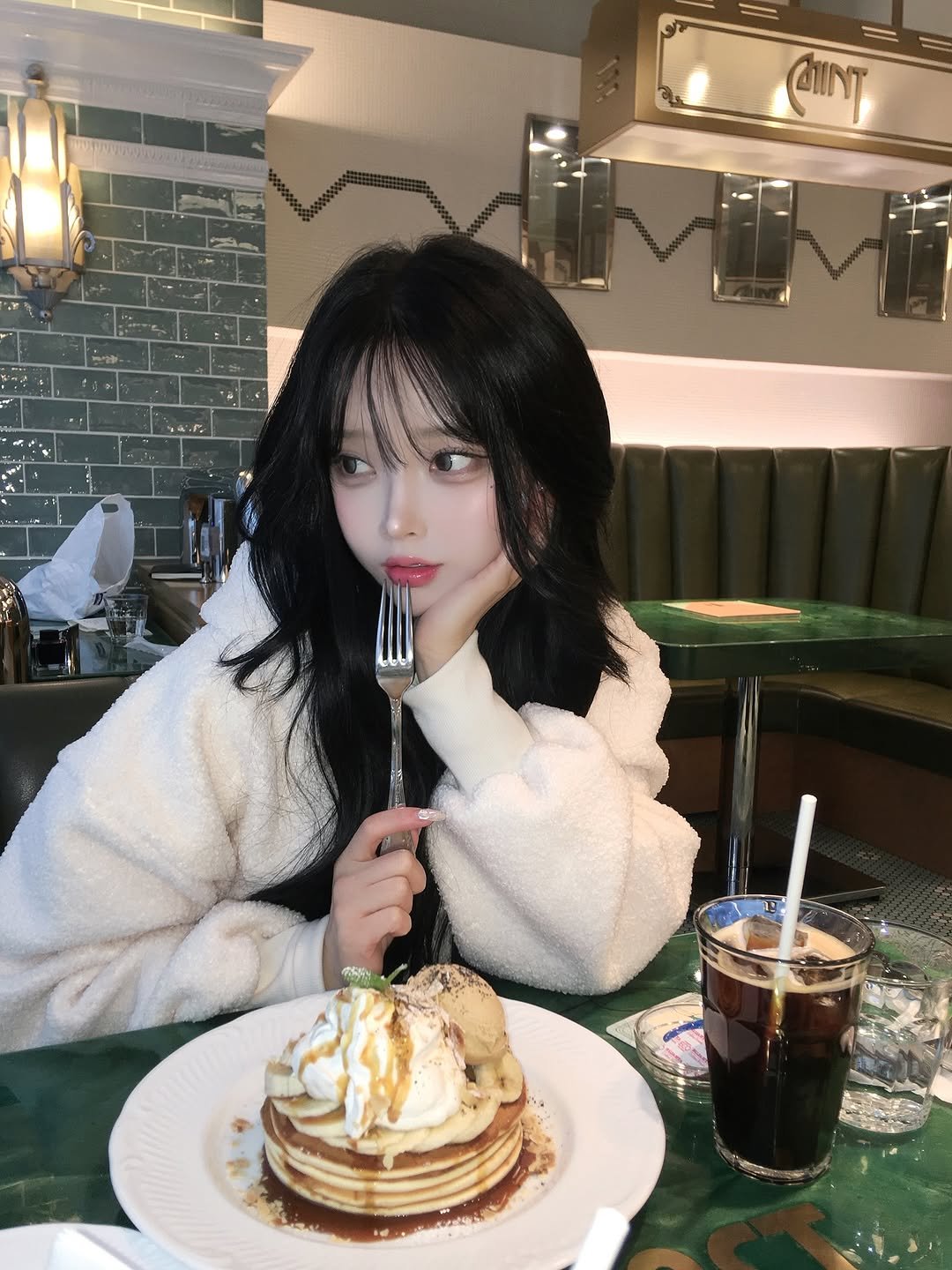 Photo by 오 지은 on February 04, 2026. May be an image of dessert, pancake, fork, pancakes and text.