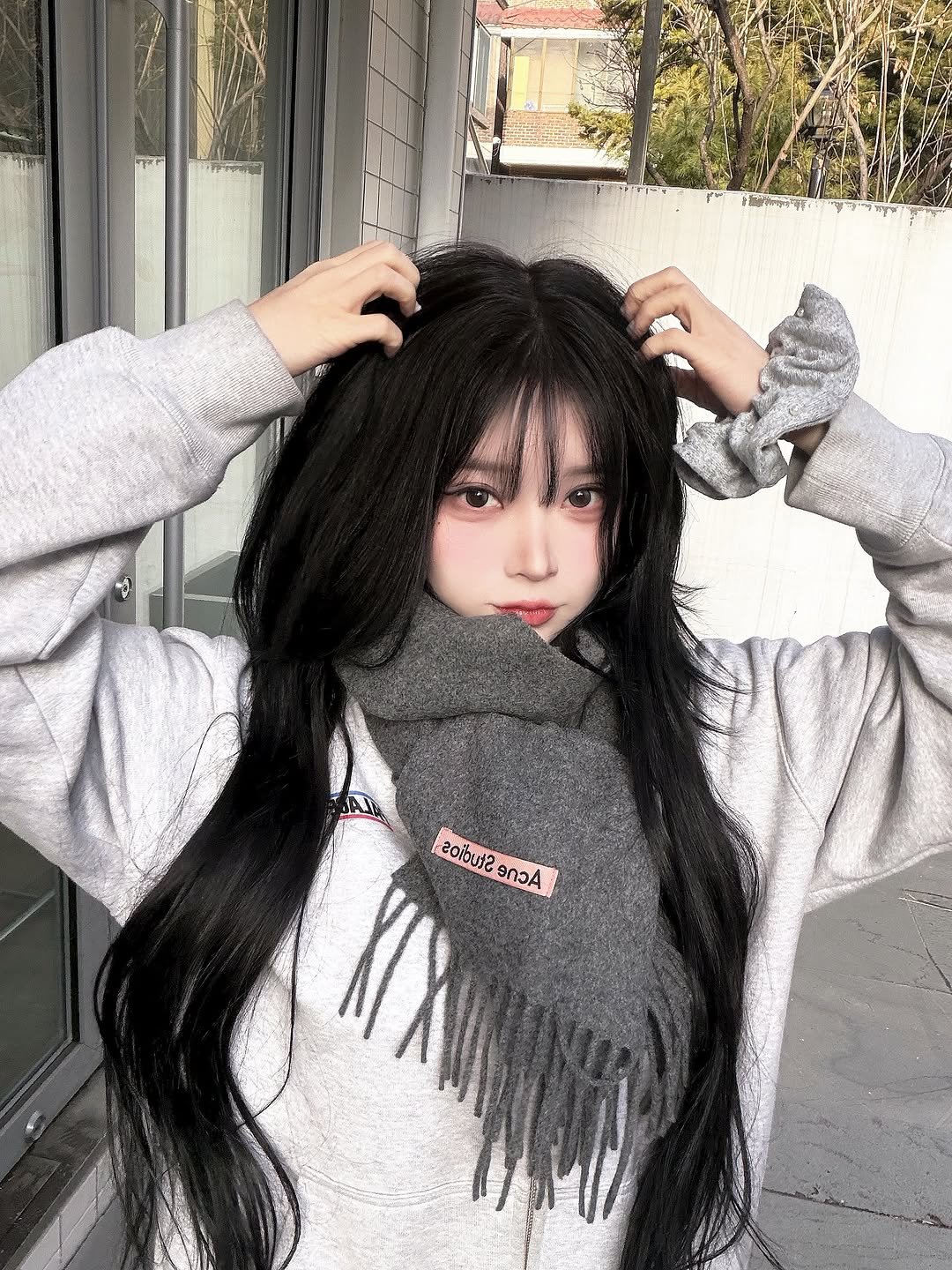 Photo by 오 지은 on January 19, 2026. May be an image of one or more people, hair, top, parka, sweatshirt, turtleneck and text.