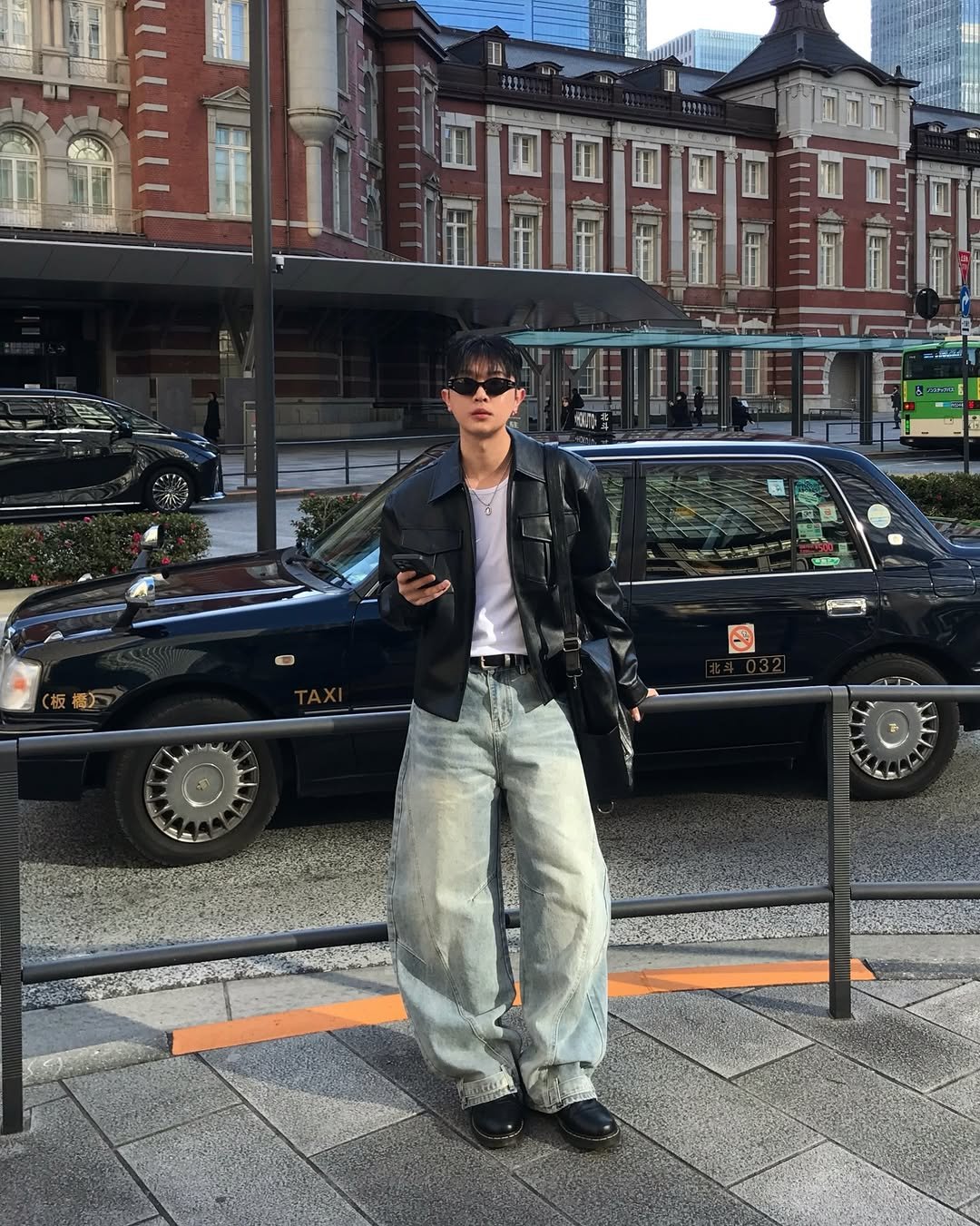 Photo by 기민 / 기틀 on February 18, 2026. May be an image of duffle coat, overcoat, kilt, street and text.