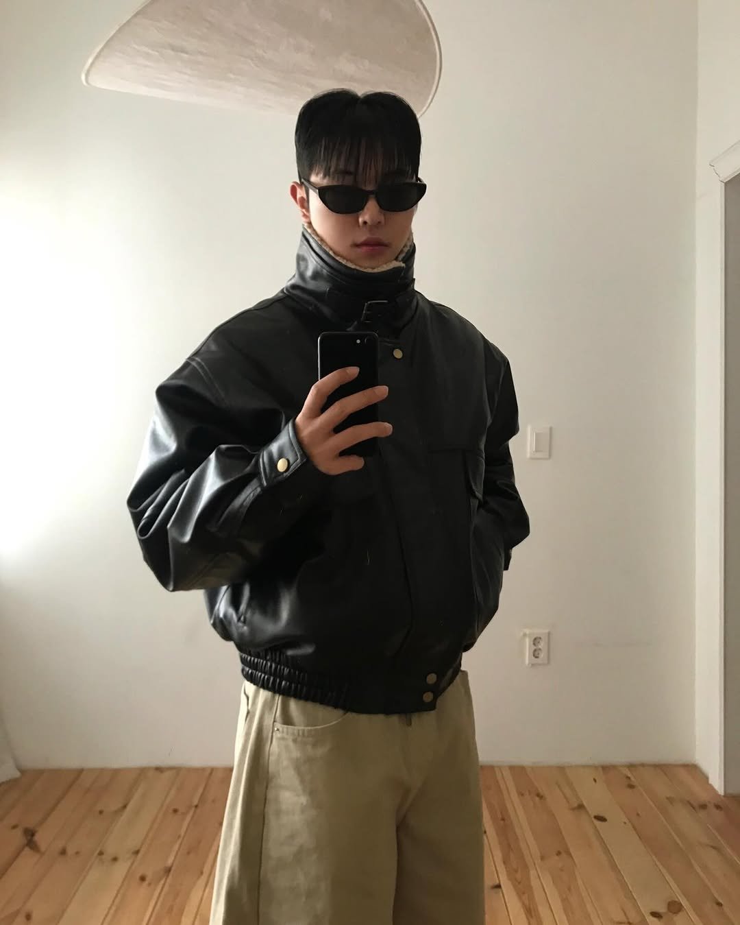 Photo by 기민 / 기틀 on January 08, 2026. May be an image of duffle coat, glasses, turtleneck, flight jacket and text.