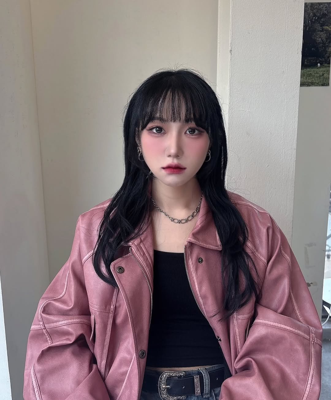 Photo by Nyx on March 03, 2026. May be an image of one or more people, makeup, hair, jacket, bath robe and text.