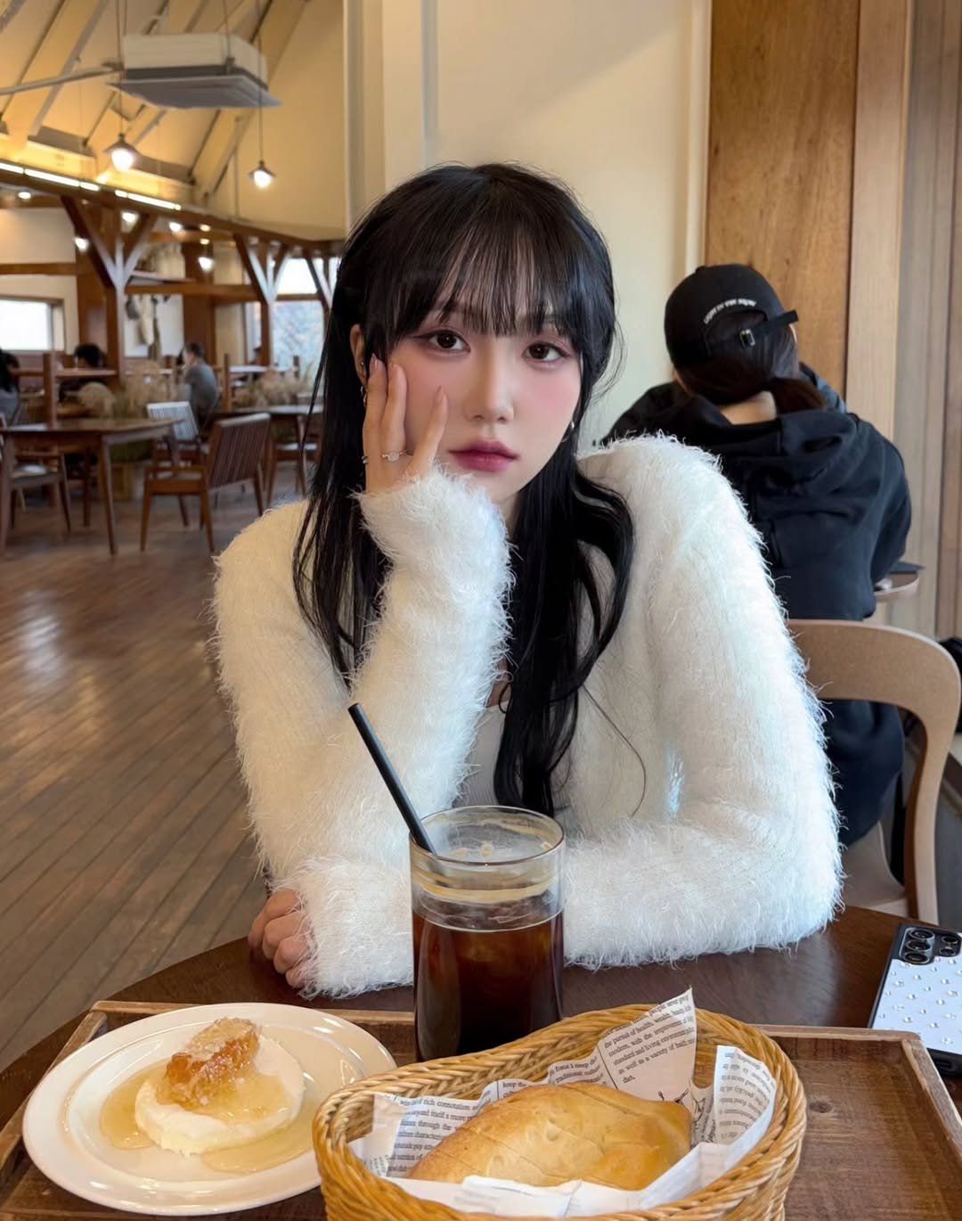 Photo by Nyx on March 21, 2026. May be an image of one or more people, hair, duffle coat, bread, pie, parka and text.