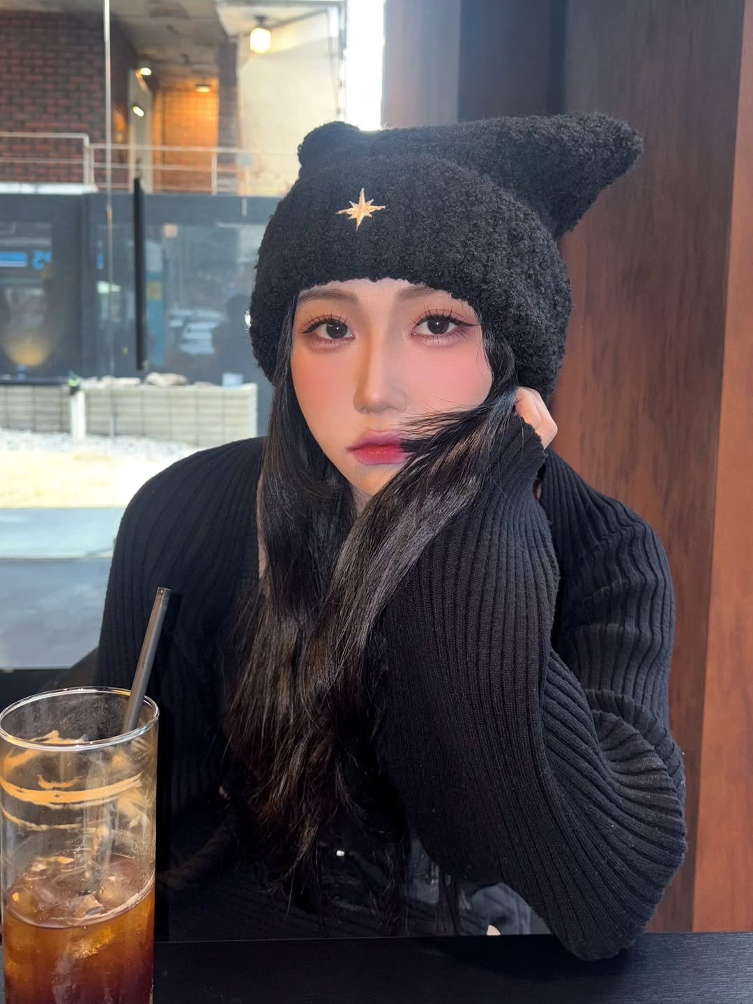 Photo shared by Nyx on February 23, 2026 tagging @ably_creator. May be an image of one or more people, hair, duffle coat, hat, beret, parka and text.