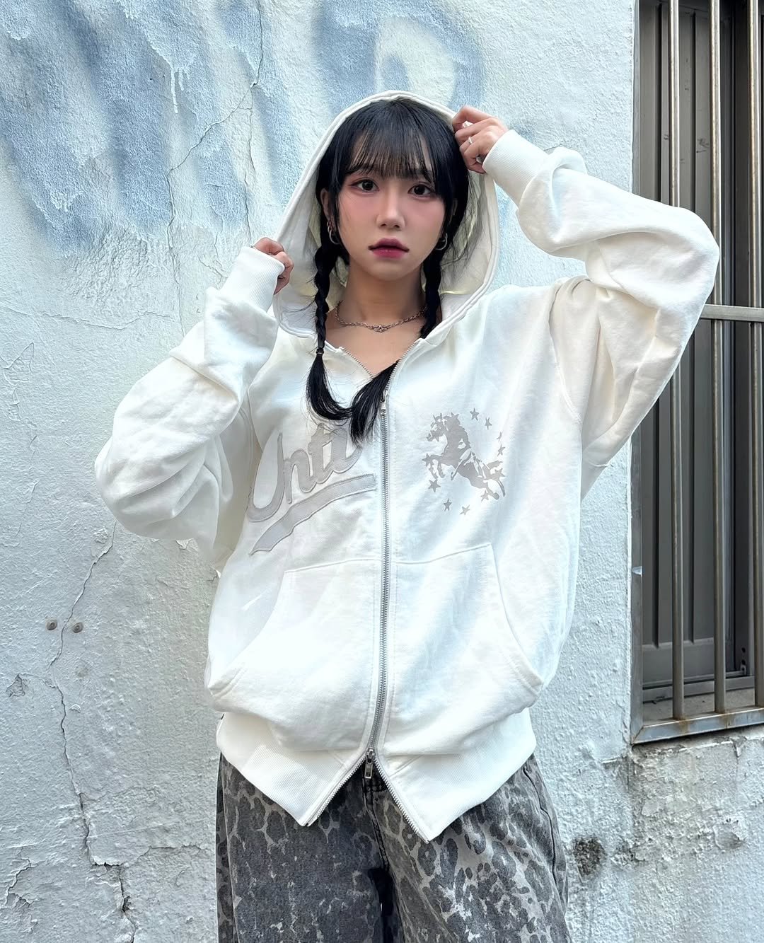 Photo shared by Nyx on March 27, 2026 tagging @untitled.seoul. May be an image of top, sweatpants, jacket, parka, coat, drawstring and text.