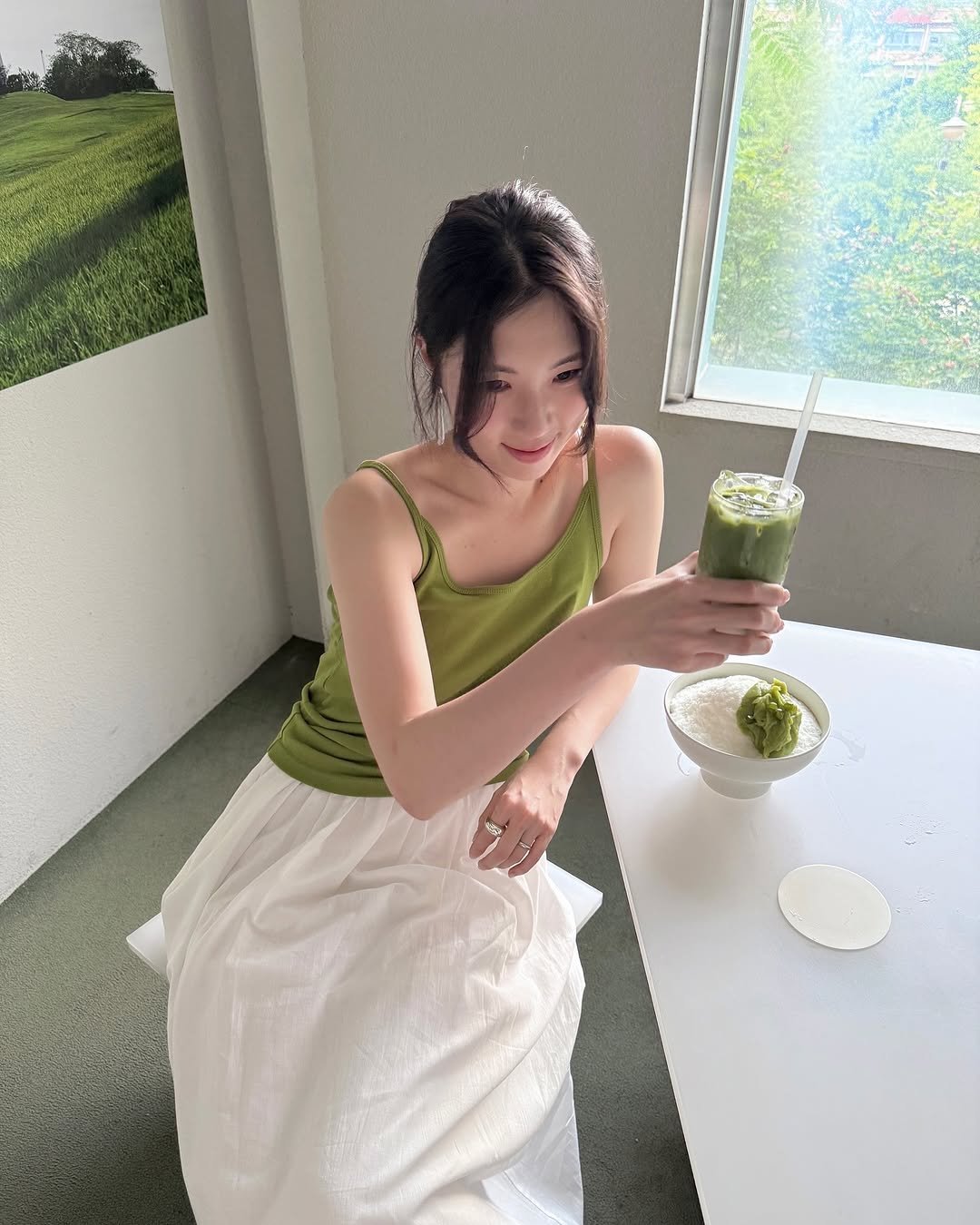 Photo by 곰송이 Songyi Moon on July 29, 2025. May be an image of 1 person, dress, smoothie and text.