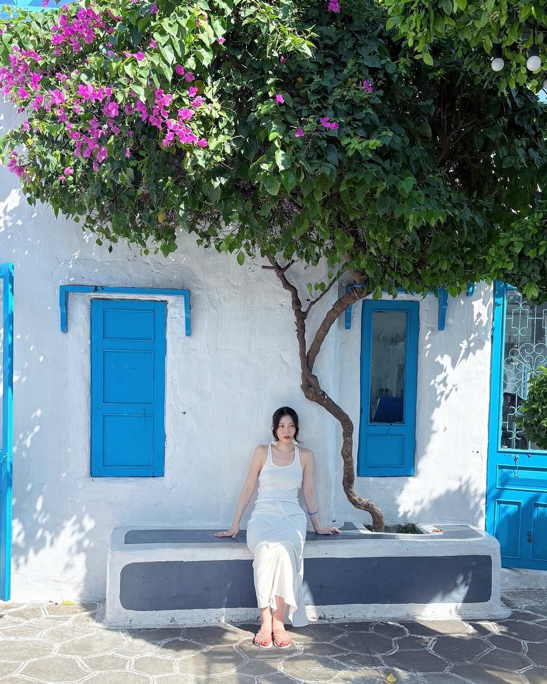 Photo by 곰송이 Songyi Moon on June 27, 2025. May be an image of 1 person, Santorini and text.