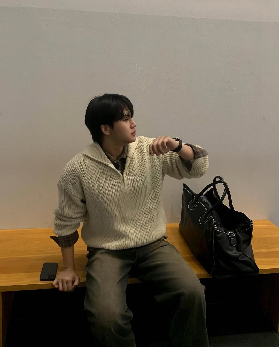 Photo shared by Good Look 굿룩 on December 30, 2025 tagging @t.o_y.o. May be an image of one or more people, hair, duffle coat, turtleneck, knit and text.