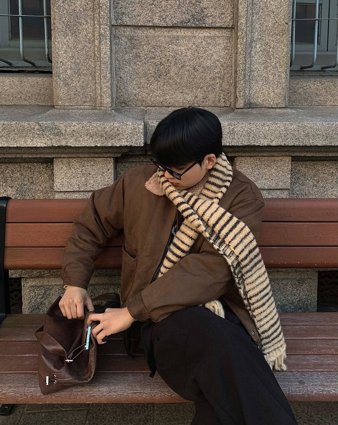 Photo shared by Good Look 굿룩 on November 17, 2025 tagging @t.o_y.o. May be an image of duffle coat, overcoat, scarf, wingtip shoes, parka, turtleneck, street and text.