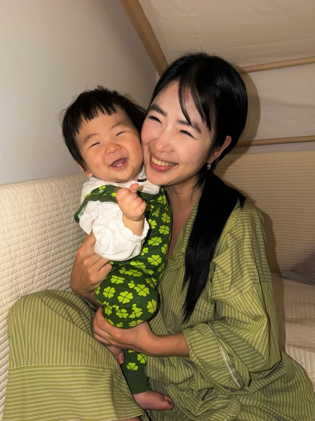 Photo by GOONIINI💚 on March 07, 2026. May be an image of baby, sleepwear, robe, bath robe and text.