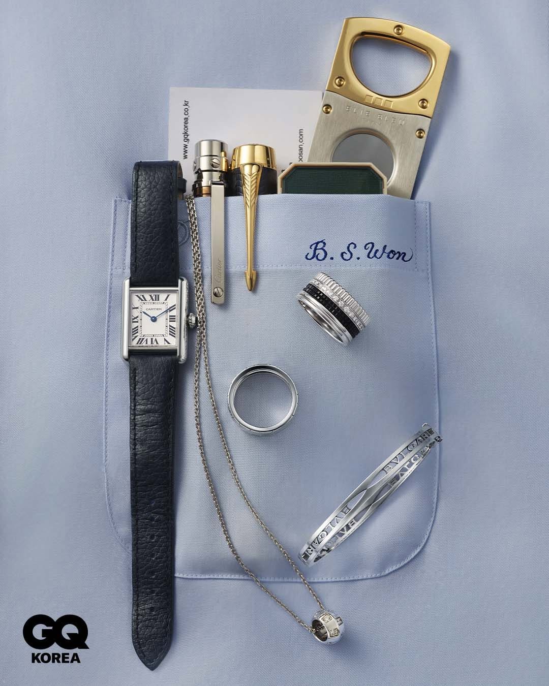 Photo shared by GQ KOREA on March 03, 2026 tagging @boucheron, @louisvuitton, @bvlgari, @cartier, and @chaumetofficial. May be an image of wrist watch, leather wallet, saddle-stitched leather, cufflinks, brass, pocketwatch, pocket knife and text that says '© © Cac DICN BBлoHbB mmm r xosan,com cam C B.S B.S.Won S. Won B. XII R IIIL RZOYTA IZAE 8 GQ KOREA'.