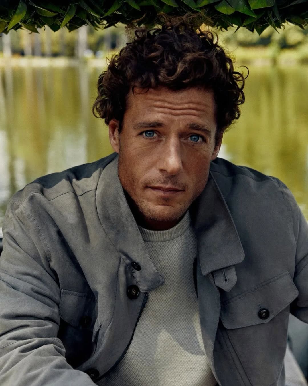 Photo shared by GQ KOREA on November 28, 2025 tagging @olzen_official. May be an image of one or more people, poster, parka, jacket and text.