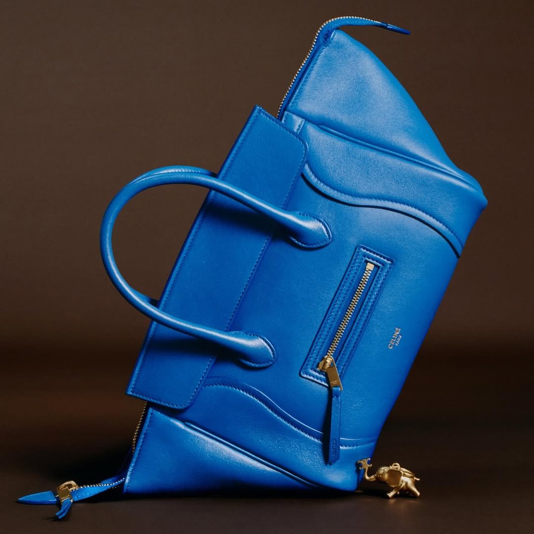 Photo by GQ KOREA on November 30, 2025. May be an image of saddle-stitched leather, clutch, briefcase, purse, pouch and text.