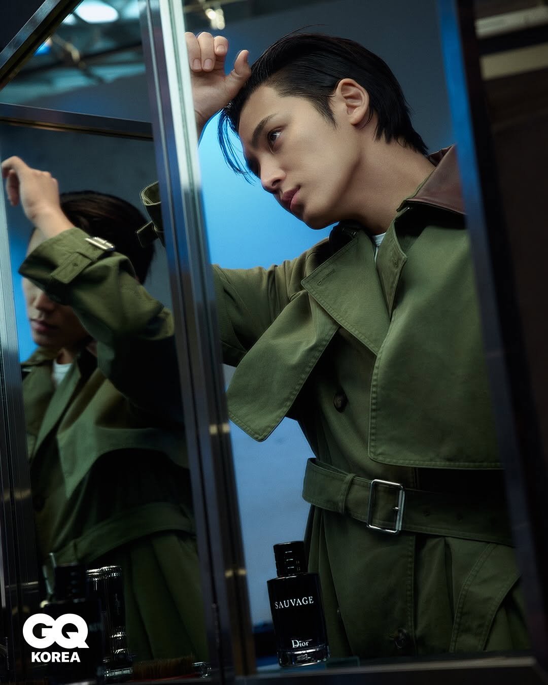 Photo shared by GQ KOREA on March 03, 2026 tagging @diorbeauty, and @min9yu_k. May be an image of one or more people, duffle coat, overcoat, military uniform, parka, top and text that says 'SAUVAGE VAGE GQ KOREA Dior Hjos'.
