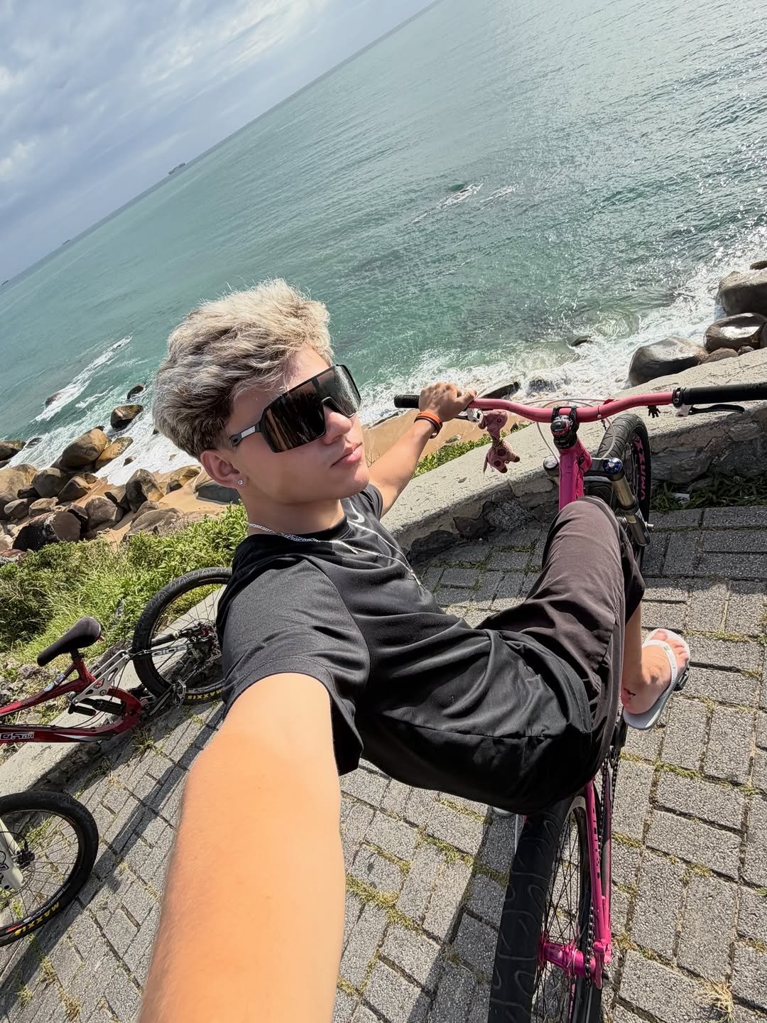 Photo by Gustavo Borges on January 04, 2026. May be an image of bicycle, ocean and text.