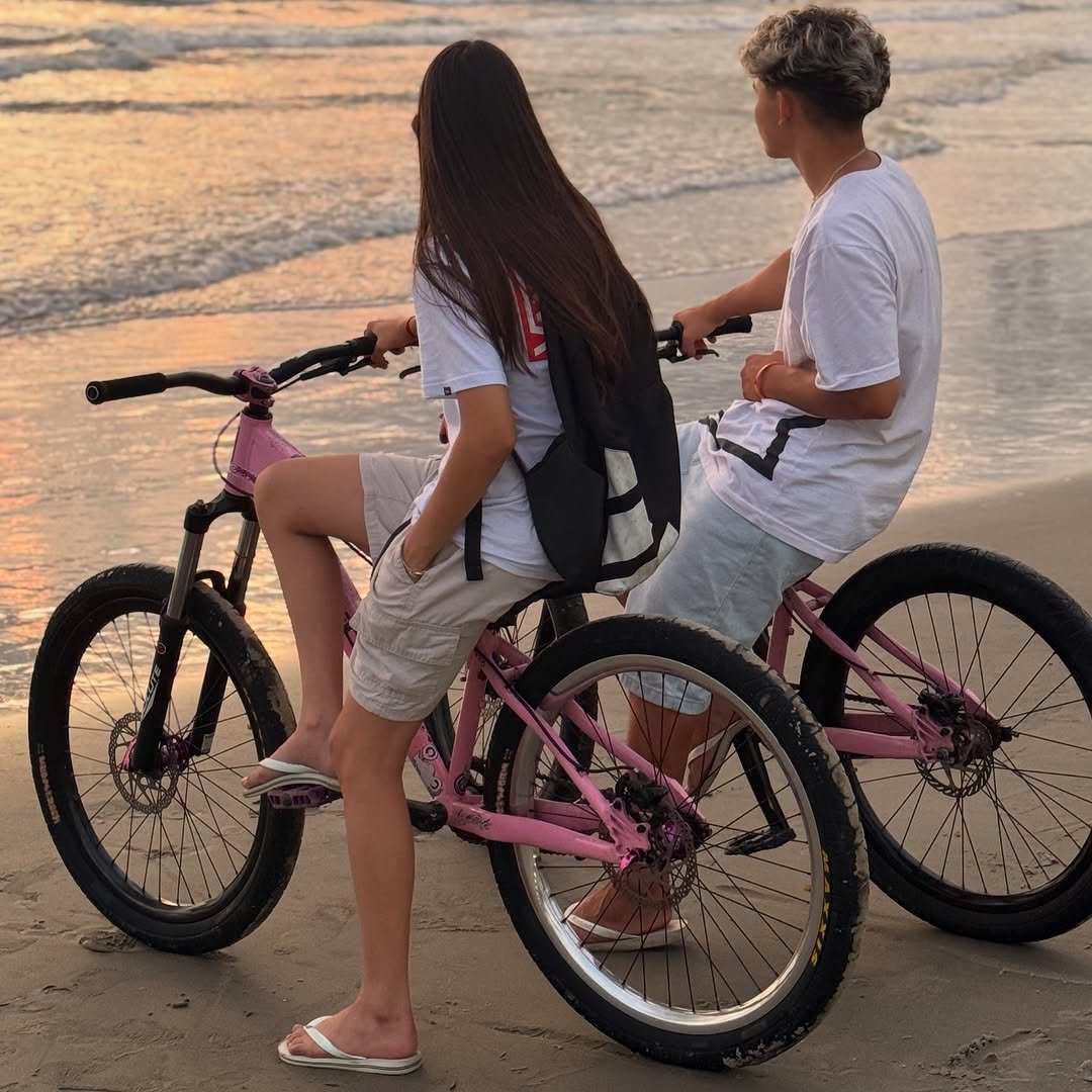 Photo by Gustavo Borges on December 31, 2025. May be an image of bicycle, scooter, beach and text.