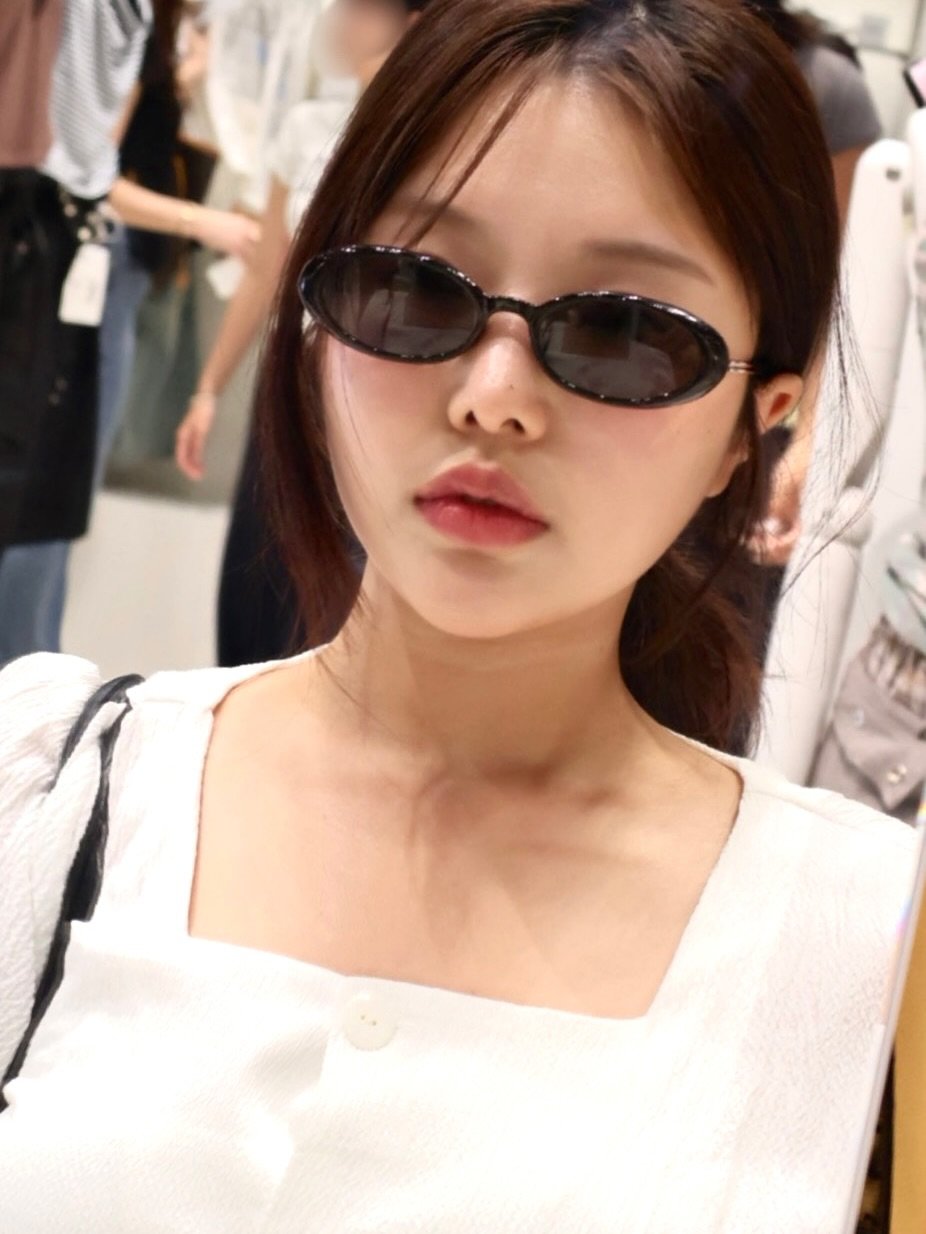 Photo by HAYEON on August 09, 2025. May be an image of 1 person, hair, top, sunglasses and text.