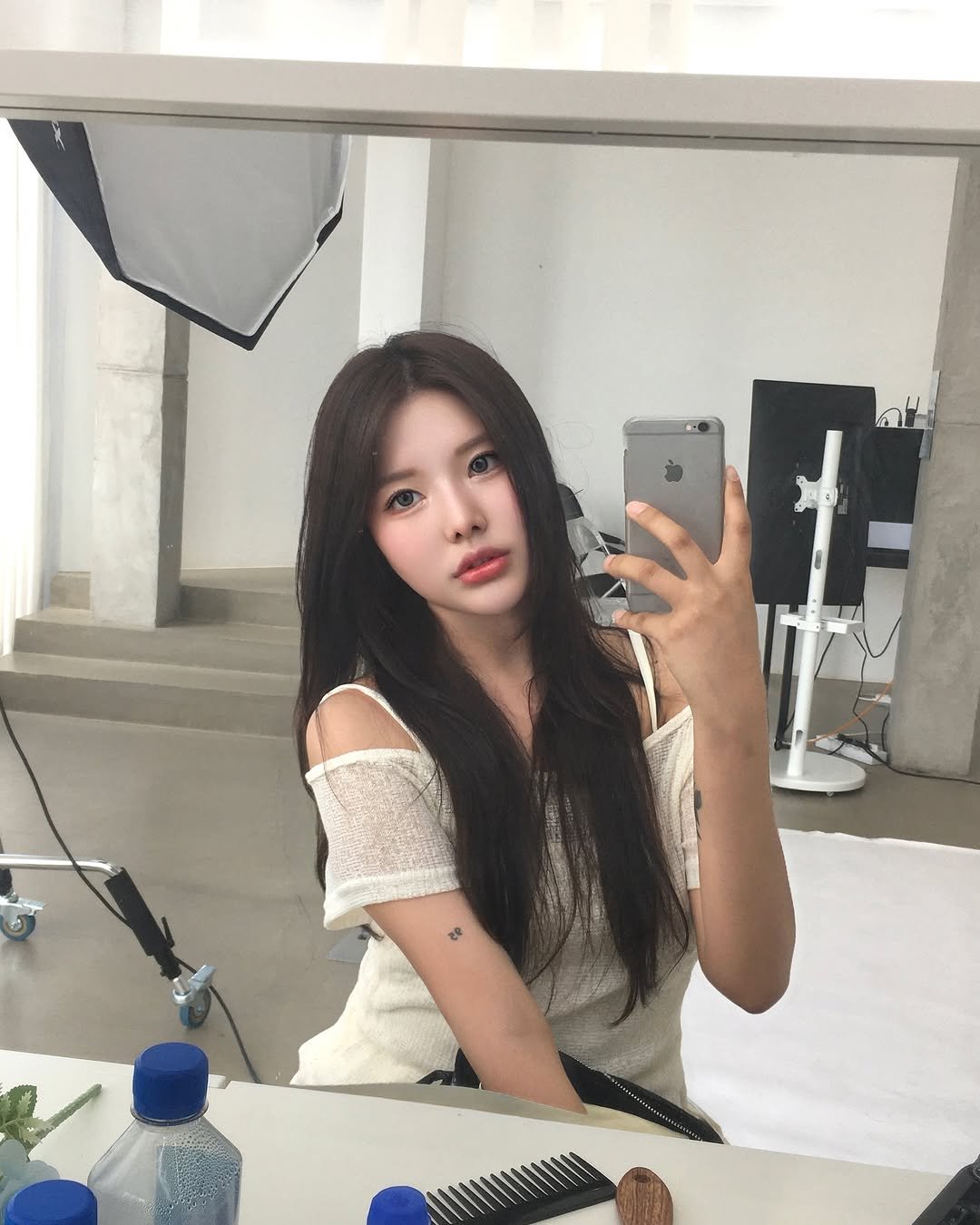 Photo shared by HAYEON on July 30, 2025 tagging @diaclinic. May be an image of 1 person, braids, long hair, mirror, top and text.
