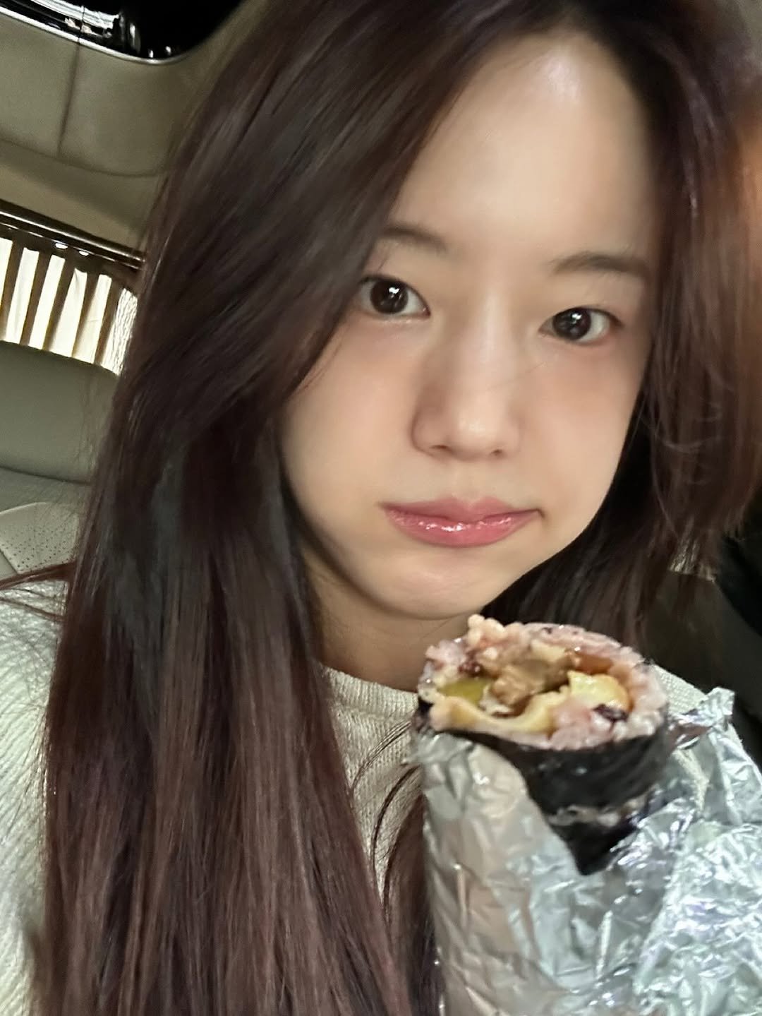 Photo by 장규리 on September 07, 2025. May be an image of 1 person, burrito and text.