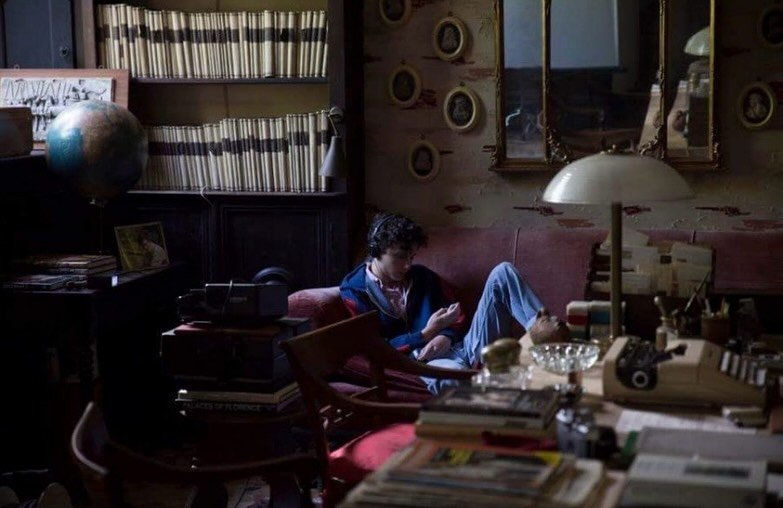 Photo by 장규리 on September 01, 2025. May be an image of 1 person, studying, cigarette, typewriter, telephone, newspaper and text.
