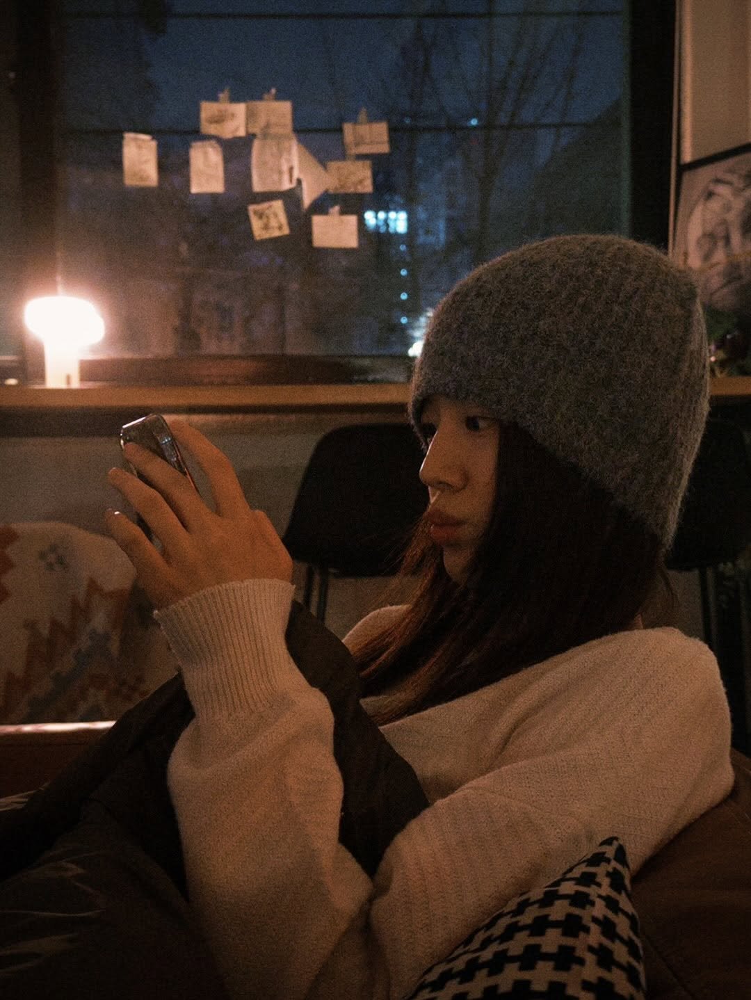 Photo by 장규리 on December 12, 2025. May be an image of hat, knit, lantern, candle, night and text.