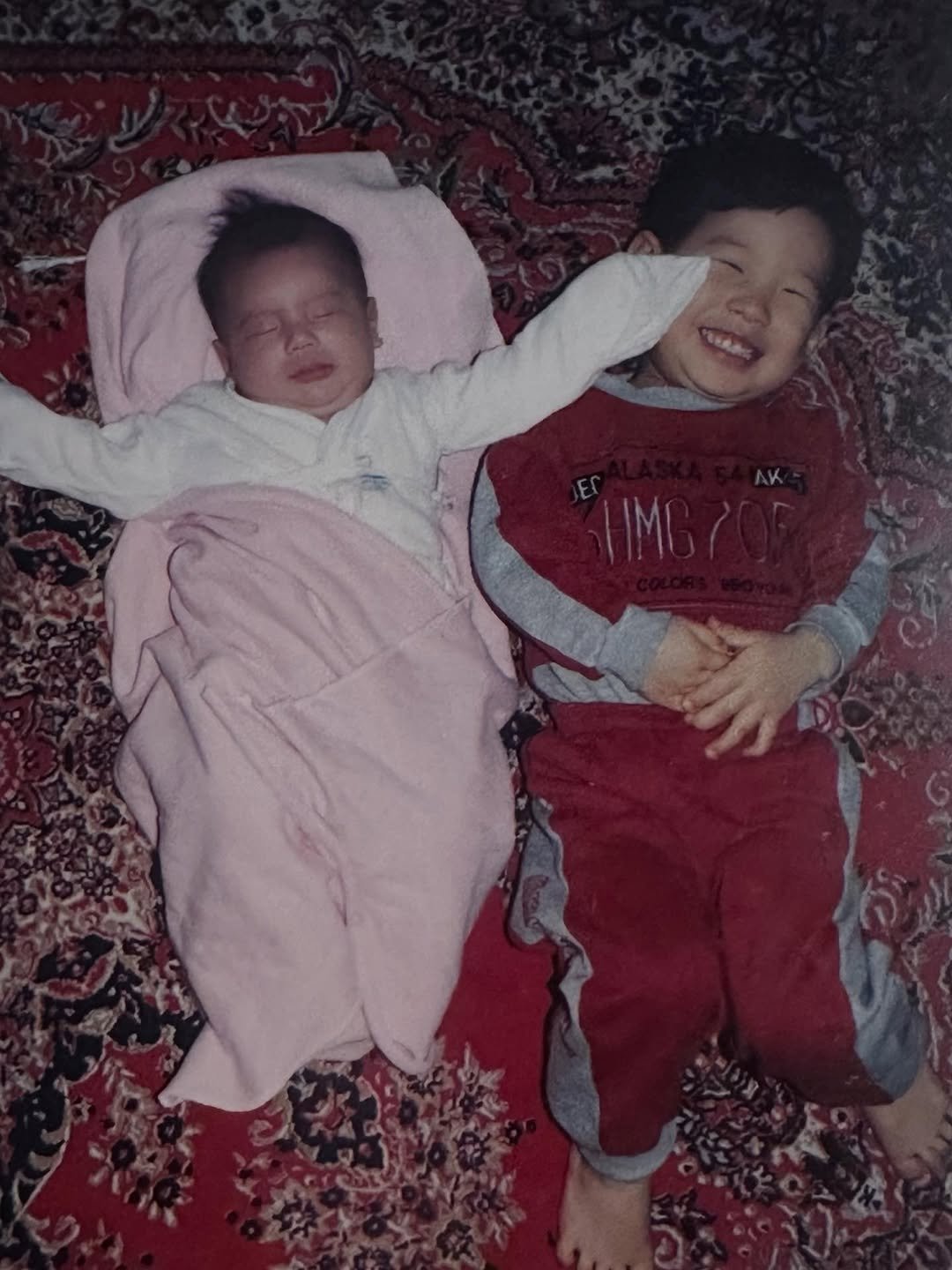 Photo by 장규리 on November 23, 2025. May be an image of baby, smiling, blanket and text.