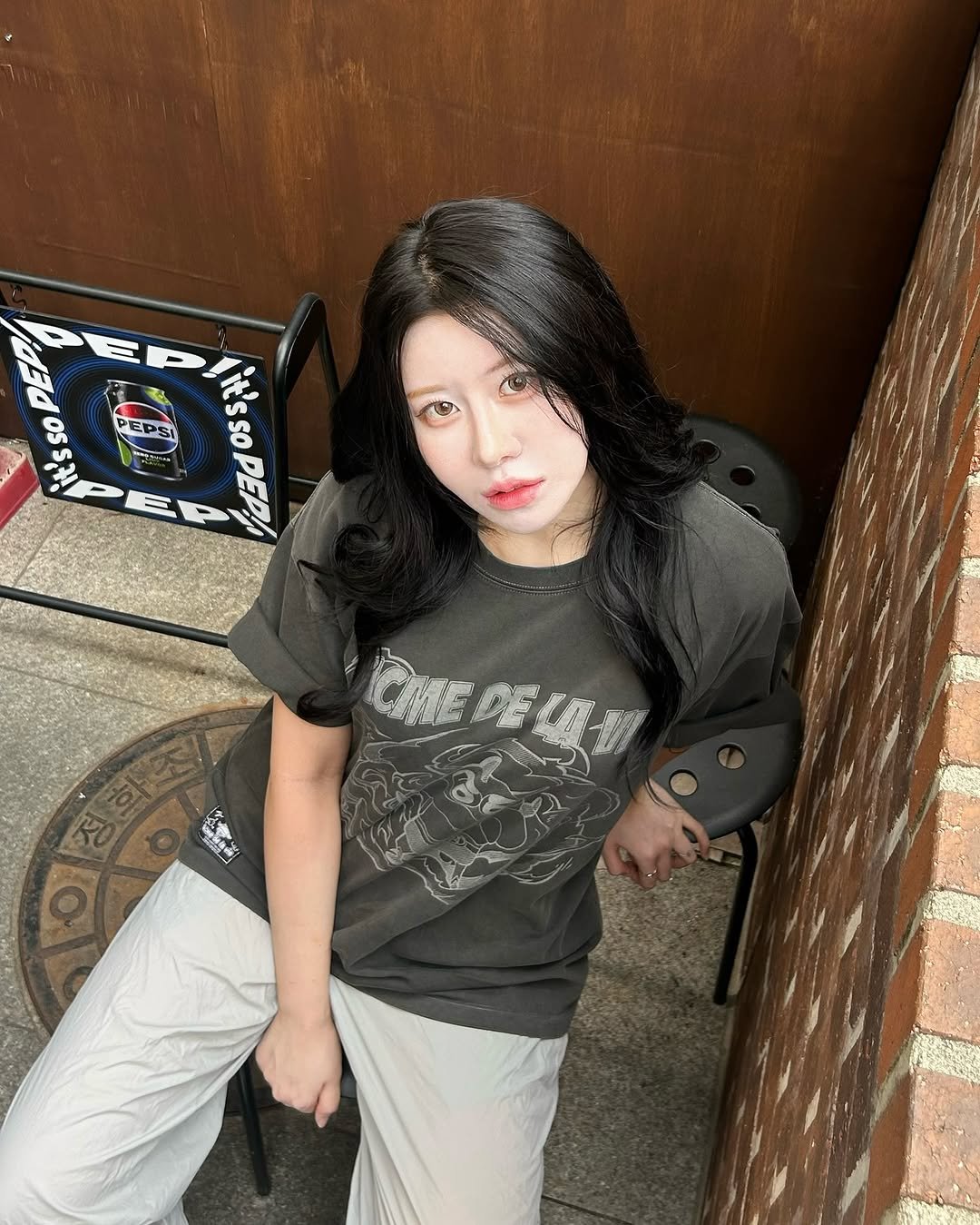 Photo shared by 흿 on July 07, 2025 tagging @adlv_official. May be an image of 1 person, hair, top and text.