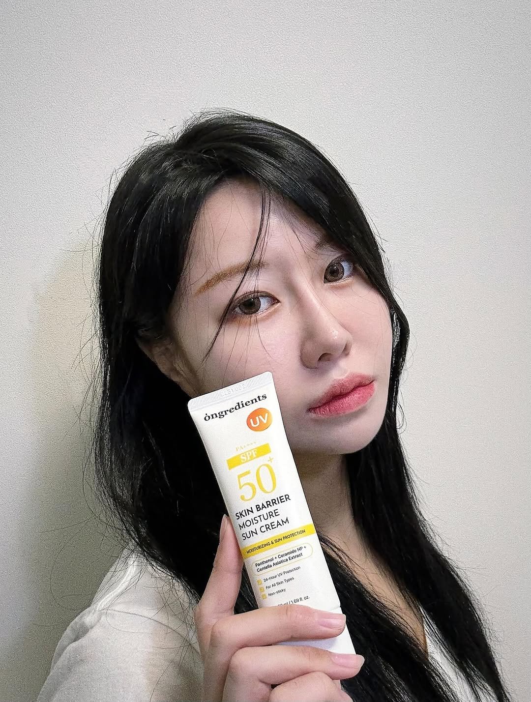 Photo by 흿 on July 26, 2025. May be an image of 1 person, hair, hair product, ointment, hand cream, lotion and text.