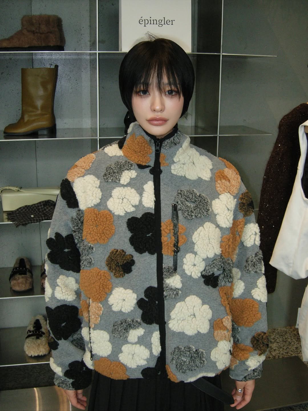 Photo shared by 하경 on September 21, 2025 tagging @epingler.official. May be an image of 1 person, overcoat, duffle coat, flight jacket and text.