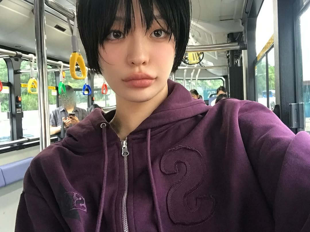 Photo shared by 하경 on September 14, 2025 tagging @sunburnproject. May be an image of 1 person, hair, bus and text.