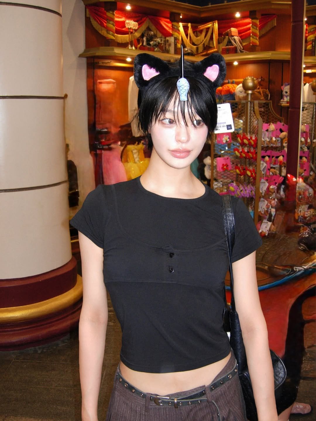 Photo shared by 하경 on August 04, 2025 tagging @3hreeto8ighty. May be an image of 1 person, costume, eye patch, headdress, miniskirt and text.