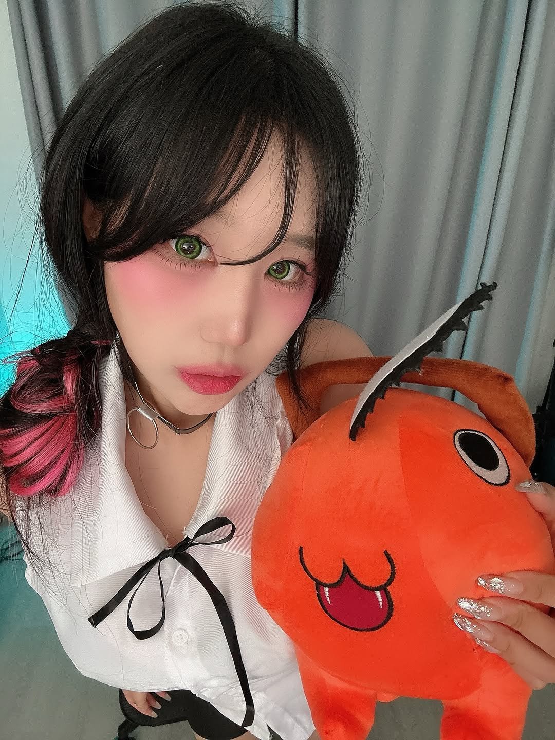 Photo by 해봄 on November 02, 2025. May be an image of one or more people, hair, costume and text.