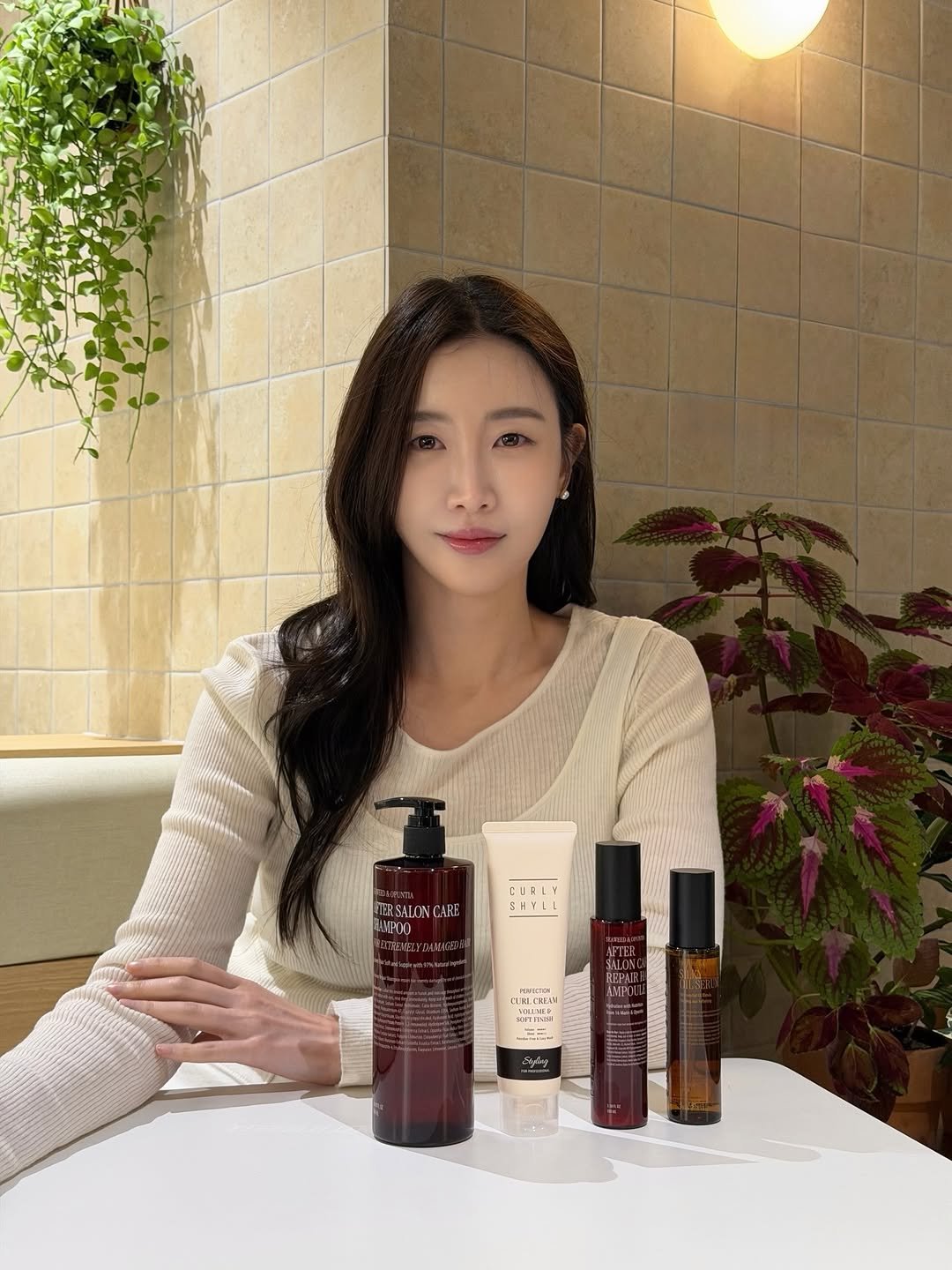 Photo shared by 해롱이 ❤️ on December 13, 2025 tagging @curlyshyll_official. May be an image of one or more people, hair, makeup, hair product, fragrance, bottle, lotion, hand cream and text.