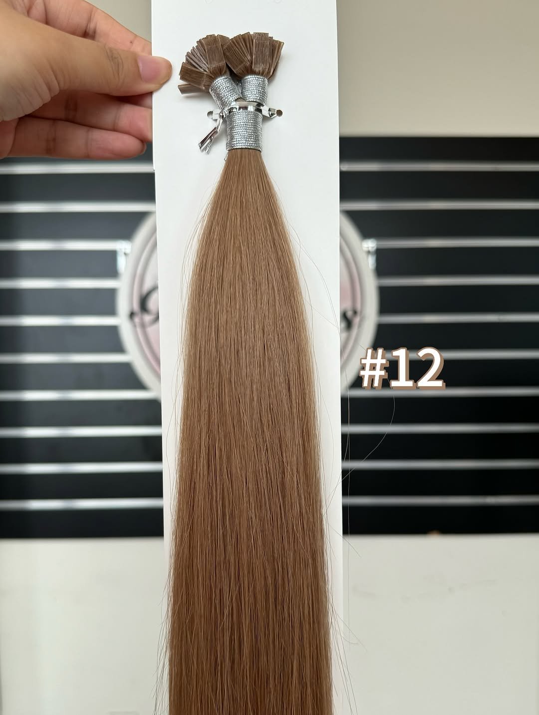 Photo by Alice Mao on January 08, 2026. May be an image of one or more people, braids, long hair, brush and text.