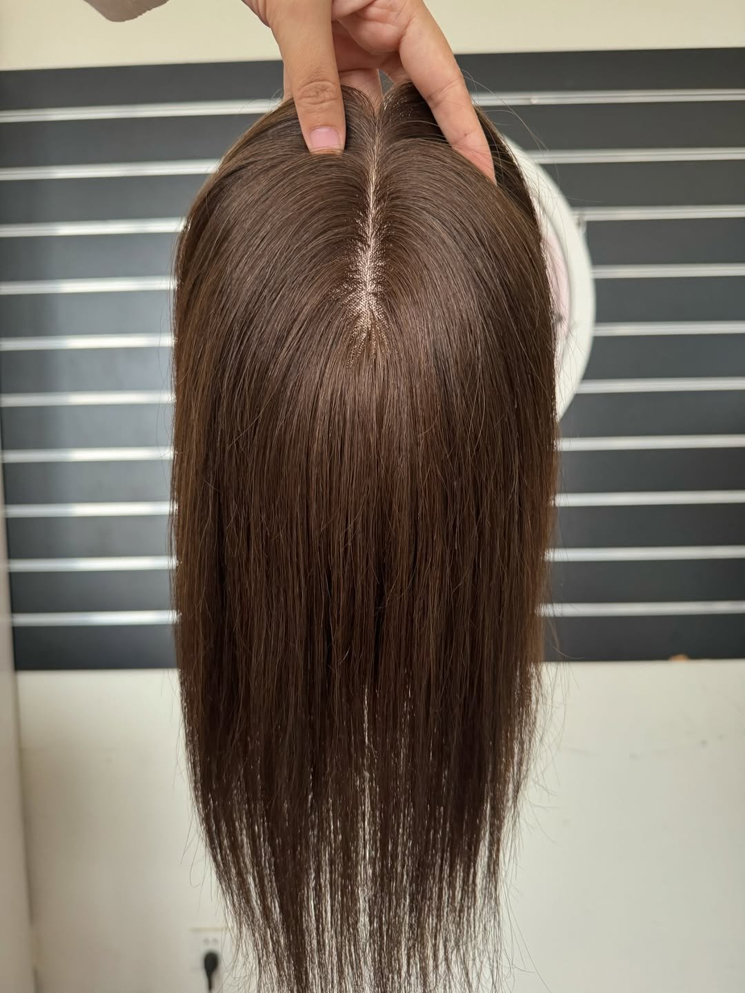 Photo by Alice Mao on December 02, 2025. May be an image of one or more people, braids, long hair, mannequin and text.