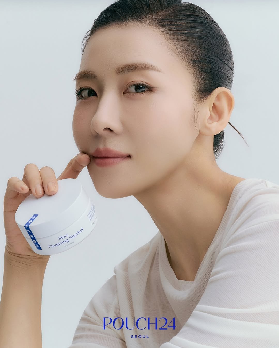Photo shared by 하지원 on April 24, 2026 tagging @pouch24_official. May be an image of one or more people, makeup, cosmetics, hand cream and text.