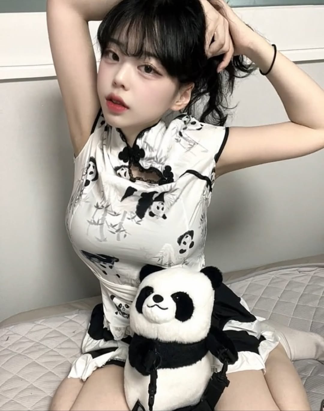 Photo by 손지냥 | 냥까스 on November 02, 2025. May be an image of panda, sleepwear and text.