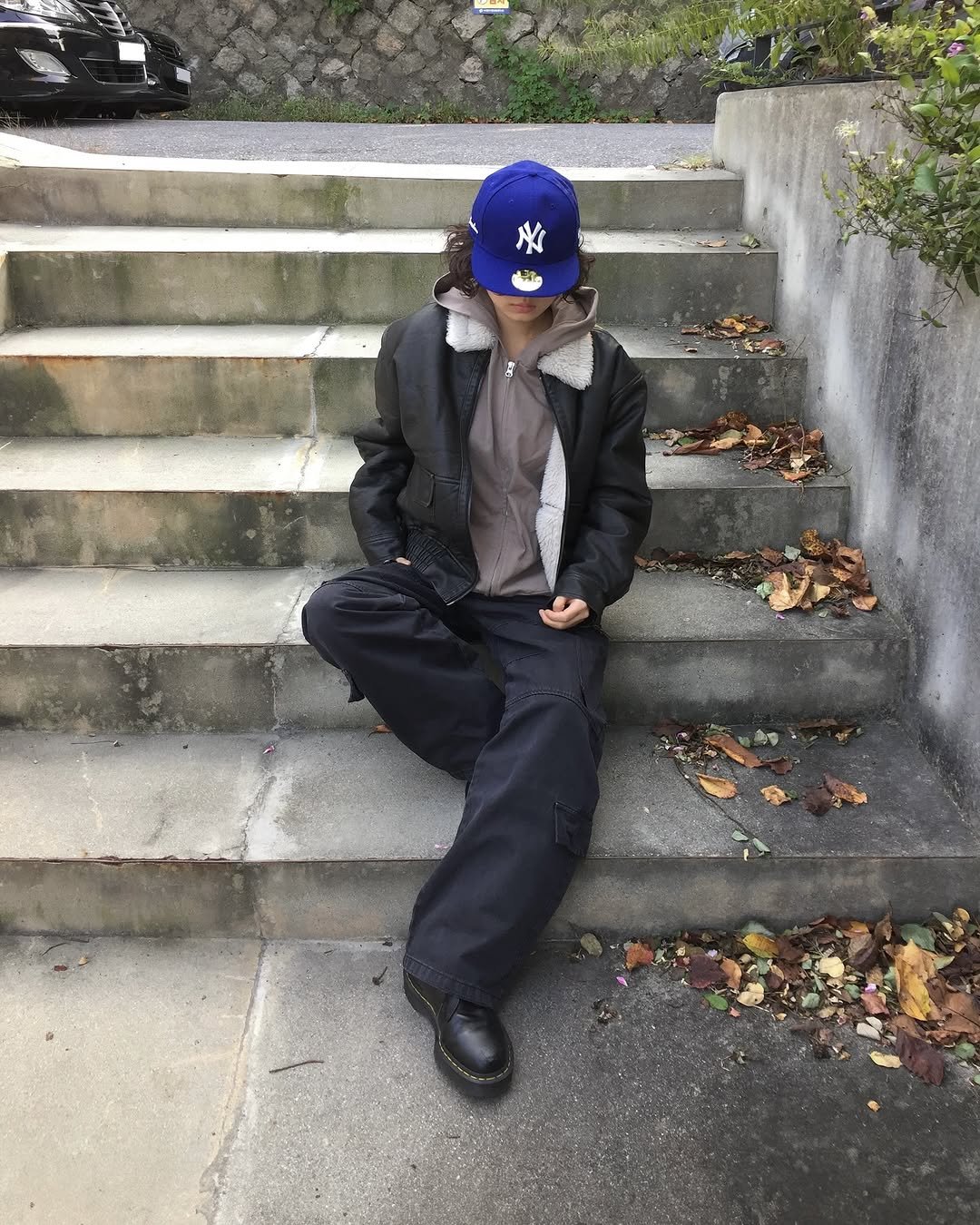 Photo shared by 한울 | 모노한울 on November 05, 2025 tagging @neweracap. May be an image of wingtip shoes, sweatpants and text.