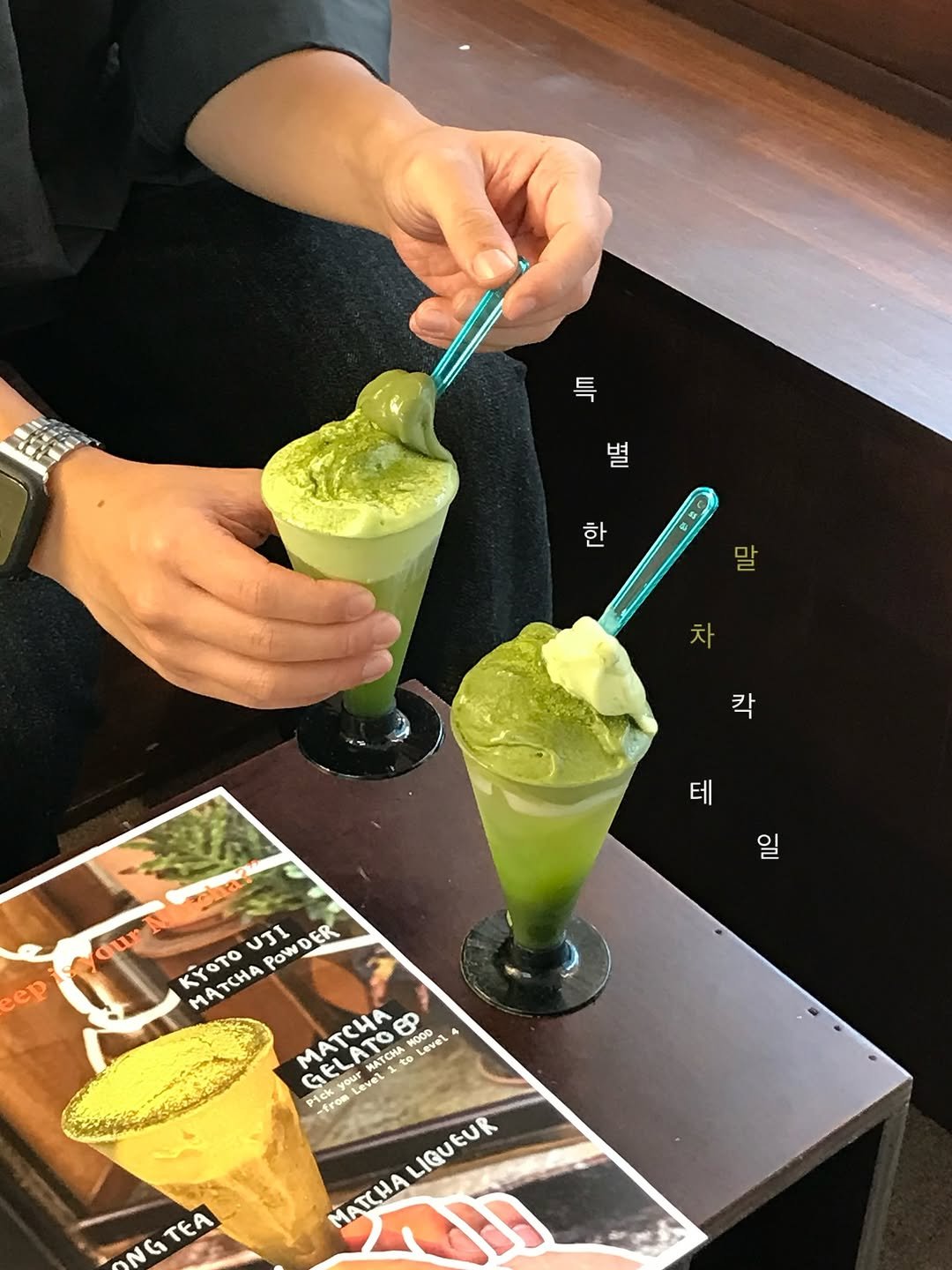 Photo shared by 한 컾 | 카페 • Cafe on September 26, 2025 tagging @by__martinn, and @antifreezingpoint. May be an image of ‎1 person, gelato, icecream cone, smoothie and ‎text that says '‎ا۲ 그표 한 사무 차 칵 테 aur 일 ep สรน UJI UJI ۲O۲ MATCA POWDER DER Pow MATCUA MATCHA ဆ O H0 moce 1000 Level GELATO CEATCHA your ELA ATO C7E Lave OL ATCHA しave -from LIGU LIGUEUR MATCHA NG ΤEΑ‎'‎‎.