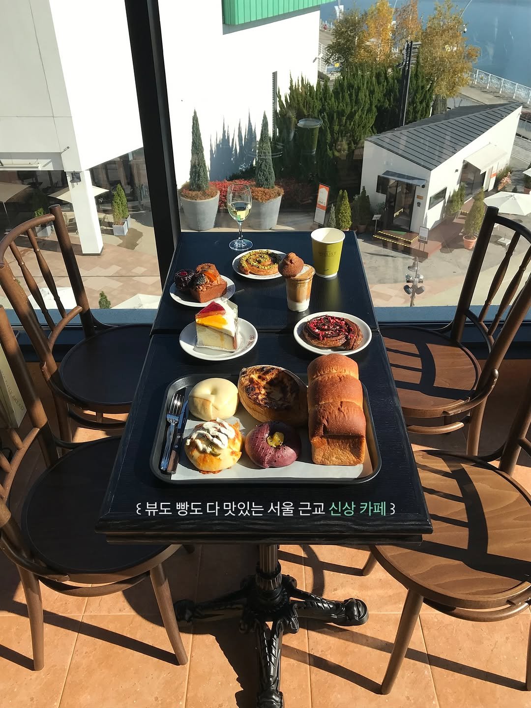 Photo shared by 한 컾 | 카페 • Cafe on November 14, 2025 tagging @millist_bakery. May be a video game screenshot of croissant and text.