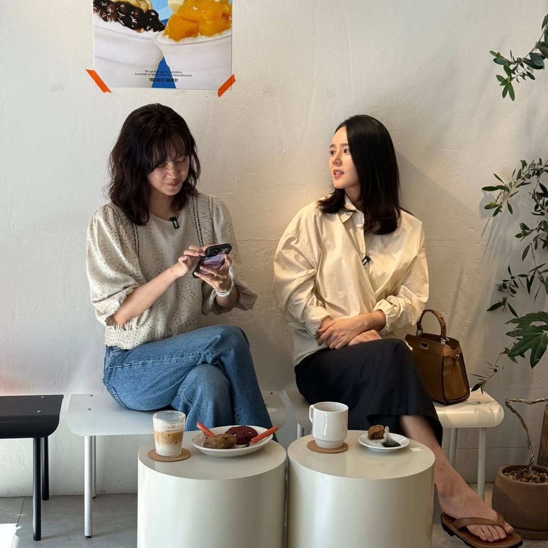 Photo shared by 한가인 on September 17, 2025 tagging @hyunbeenshin. May be an image of one or more people, coffee cup, coffee maker, smoothie, tea and cornflower.