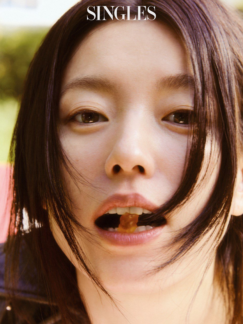 Photo by Hanhyojoo on September 30, 2025. May be an image of 1 person, hair, poster and text that says 'SINGLES ES'.