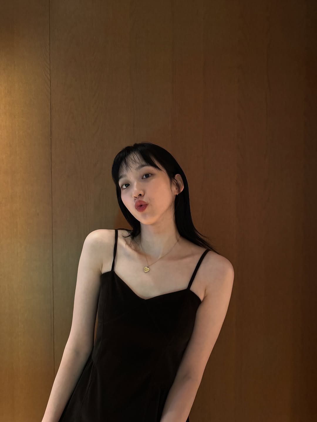 Photo by 한지현 on October 03, 2025. May be an image of 1 person, slip, sleepwear, chemise, dress, sundress and text.