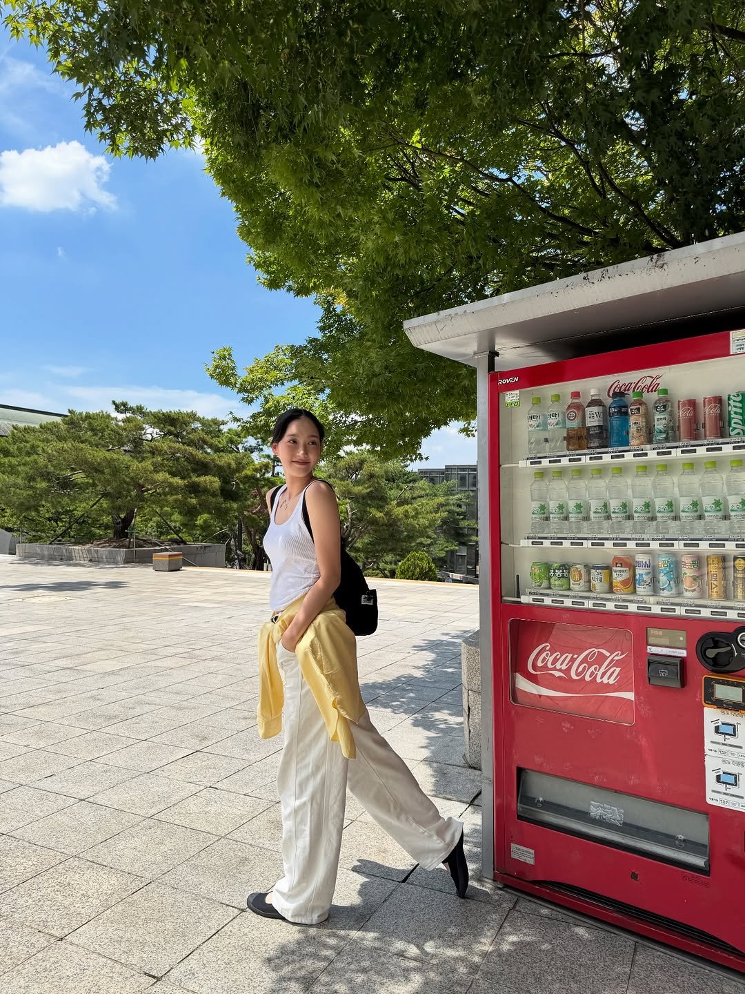 Photo by 한지현 on October 03, 2025. May be an image of 1 person, vending machine, headscarf and text.
