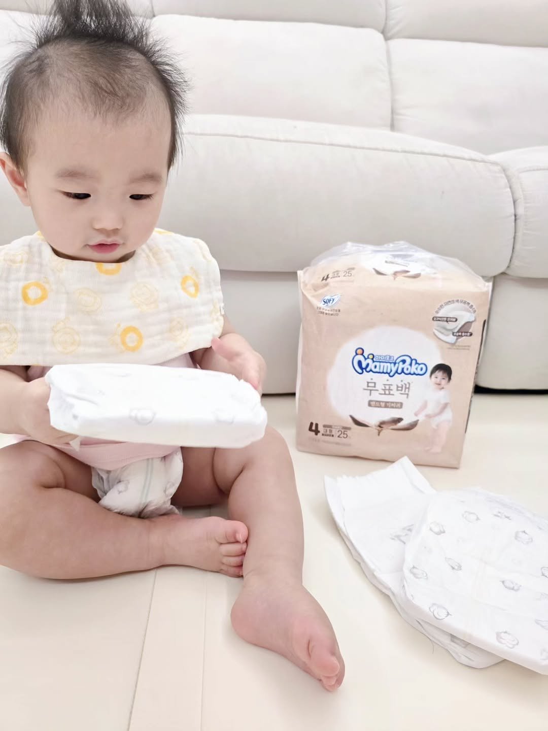 Photo shared by 한콩이 ☘️ 육아 | Motherhood | 育兒 on August 31, 2025 tagging @mamypoko.nature. May be an image of 1 person, baby, diaper, baby bed, baby shoes and text.