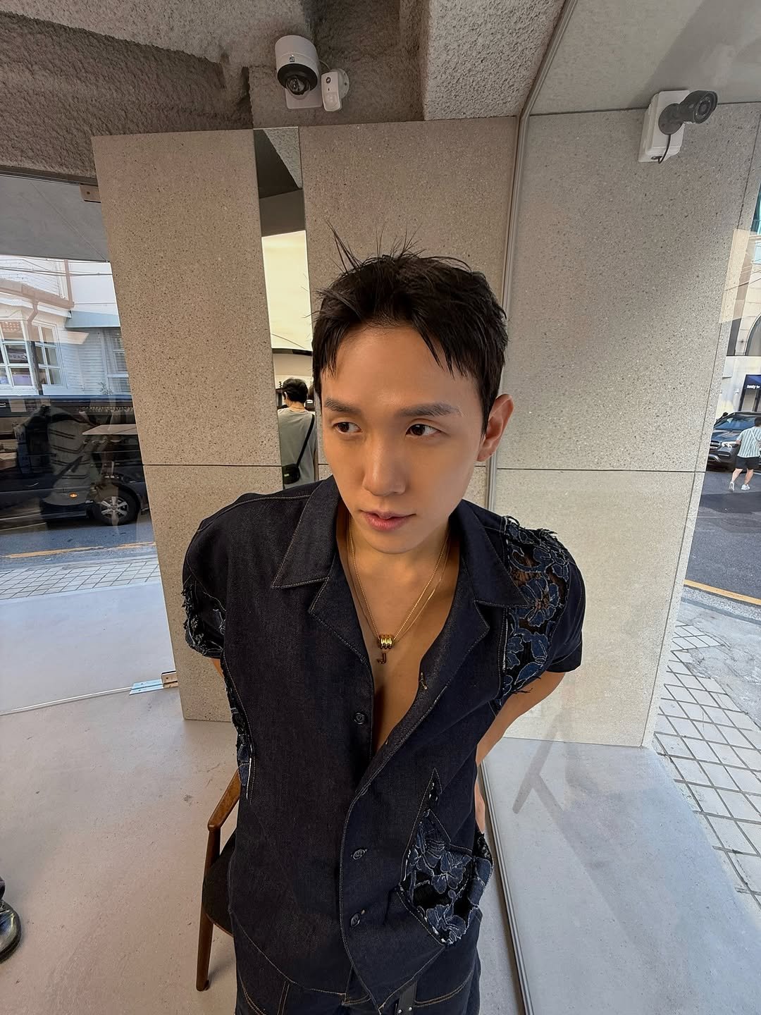 Photo shared by 한스HANS on September 17, 2025 tagging @numbering_official. May be an image of one or more people, hair and bolo tie.