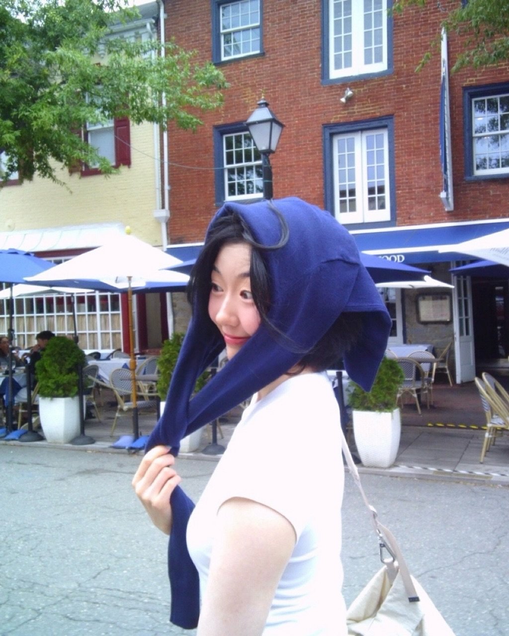 Photo by Jea Jeong on September 18, 2025. May be an image of 3 people, scarf, head covering, cloak, headscarf, beret and text.