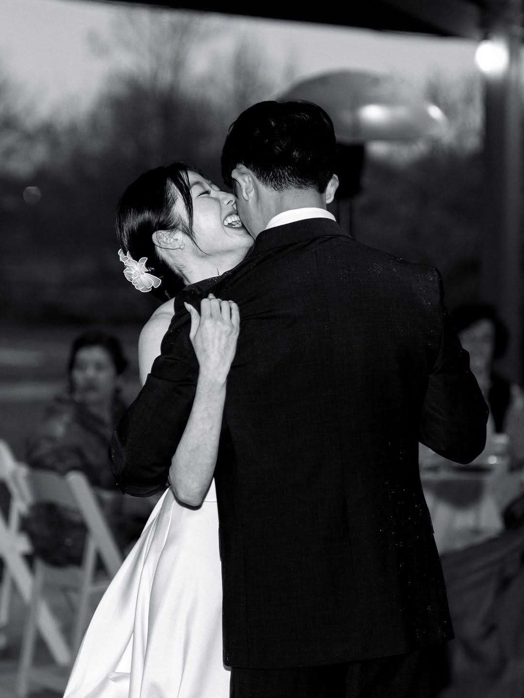 Photo by Jea Jeong on April 19, 2026. May be a black-and-white image of people kissing, wedding and text.