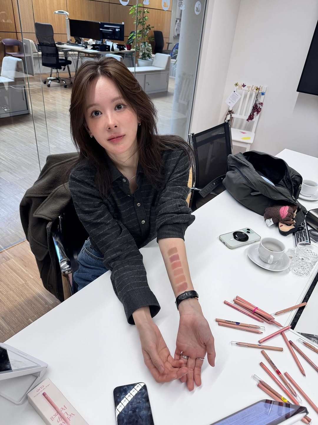 Photo shared by 해피림 메이크업 혜림쌤 on August 08, 2025 tagging @clio_official. May be an image of 1 person, studying, pen, bureau, desk, office and text.