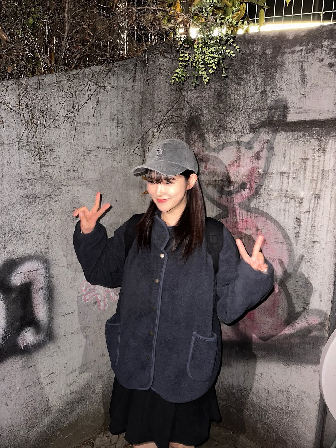 Photo shared by 최하리 입니다. on November 02, 2025 tagging @letxy_official. May be an image of duffle coat, hat, parka and text.